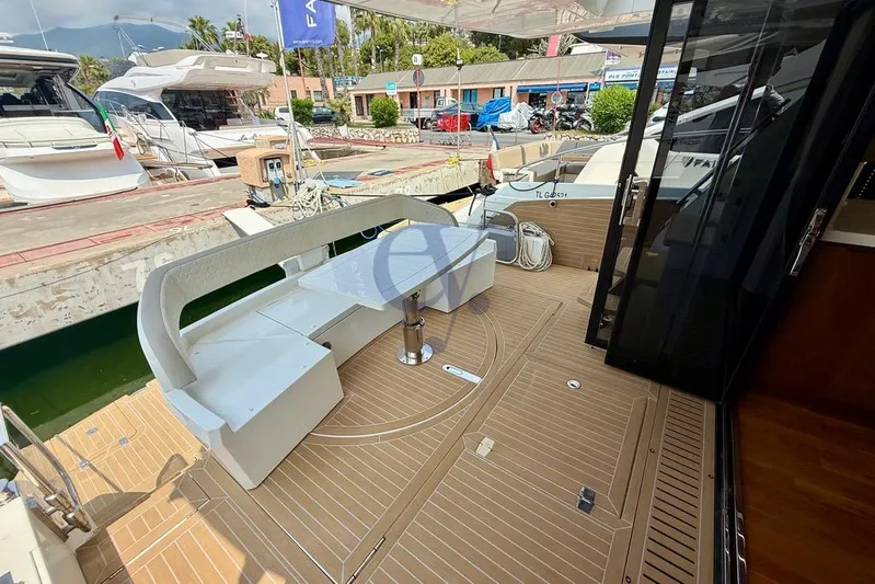  Yacht Photos Pics Luxury Galeon 460 Fly yacht deck with seating, docked at marina, 2022 model.