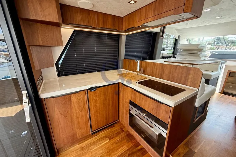  Yacht Photos Pics Luxurious interior of 2022 Galeon 460 Fly yacht with modern kitchen design.