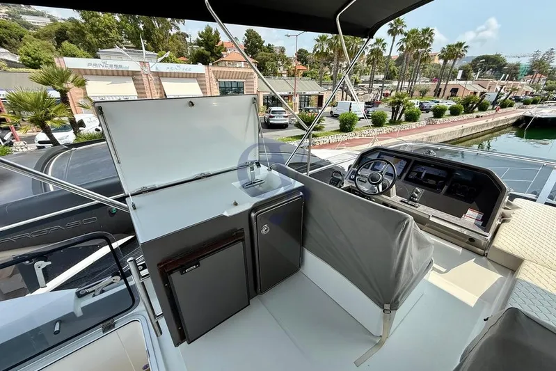  Yacht Photos Pics Flybridge of 2022 Galeon 460 Fly yacht with helm station and storage area.