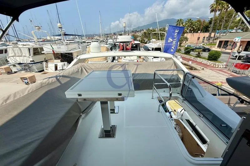  Yacht Photos Pics Flybridge view of 2022 Galeon 460 Fly yacht docked at marina.