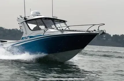  Yacht Photos Pics 2023 Extreme Boats 745 Game King cruising on water, showcasing sleek design and performance.
