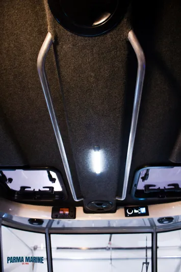  Yacht Photos Pics 2023 Extreme Boats 745 Game King interior ceiling with lighting and control panel.