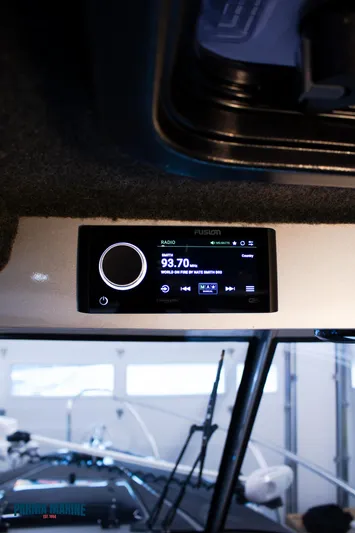  Yacht Photos Pics 2023 Extreme Boats 745 Game King interior with Fusion marine stereo system.