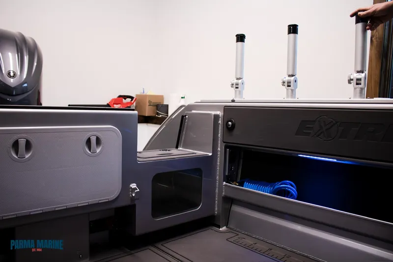  Yacht Photos Pics 2023 Extreme Boats 745 Game King interior with storage compartments and fishing rod holders.