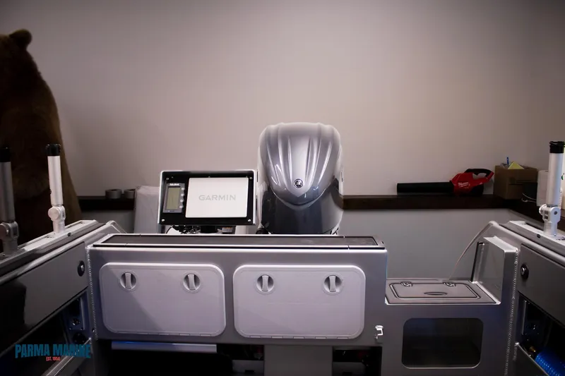  Yacht Photos Pics 2023 Extreme Boats 745 Game King dashboard with Garmin display and controls.