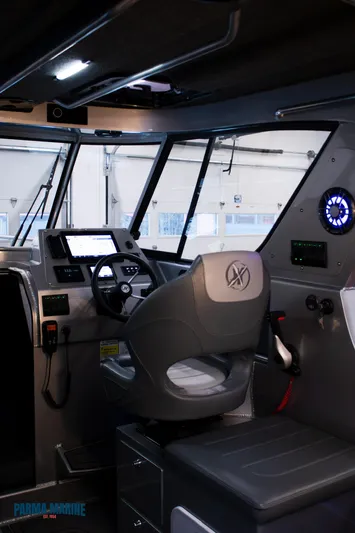  Yacht Photos Pics Interior of 2023 Extreme Boats 745 Game King, featuring modern controls and seating.