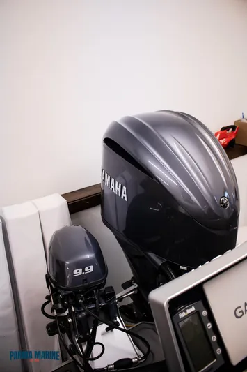  Yacht Photos Pics 2023 Extreme Boats 745 Game King with Yamaha outboard motors in a showroom.