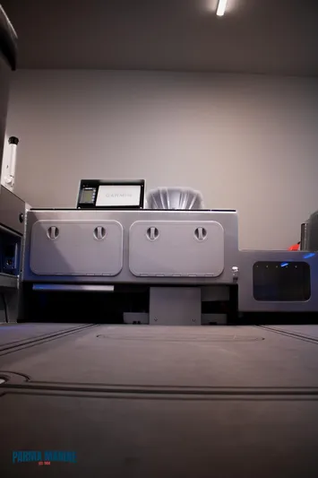  Yacht Photos Pics 2023 Extreme Boats 745 Game King interior with modern control panel and storage compartments.