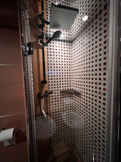  Yacht Photos Pics Luxurious shower with modern fixtures in a 2008 Conam 75 Widebody yacht.