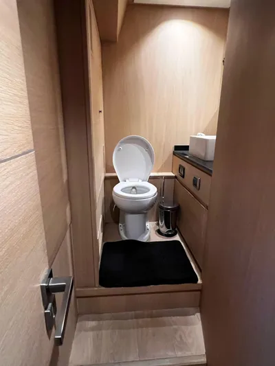  Yacht Photos Pics Bathroom interior of 2008 Conam 75 Widebody yacht, featuring modern fixtures and wooden accents.