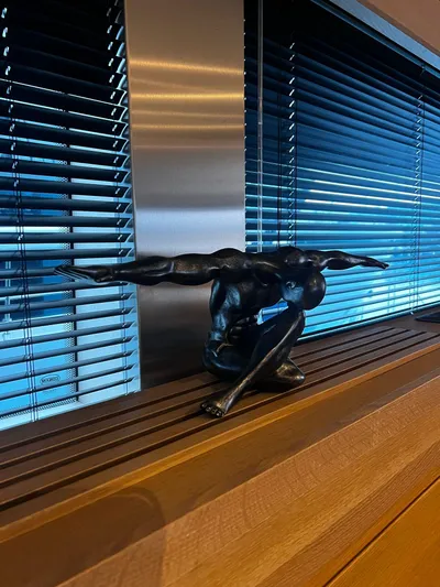  Yacht Photos Pics Sculpture of a dynamic figure on a Conam 75 Widebody yacht, 2008 model, with blinds in background.