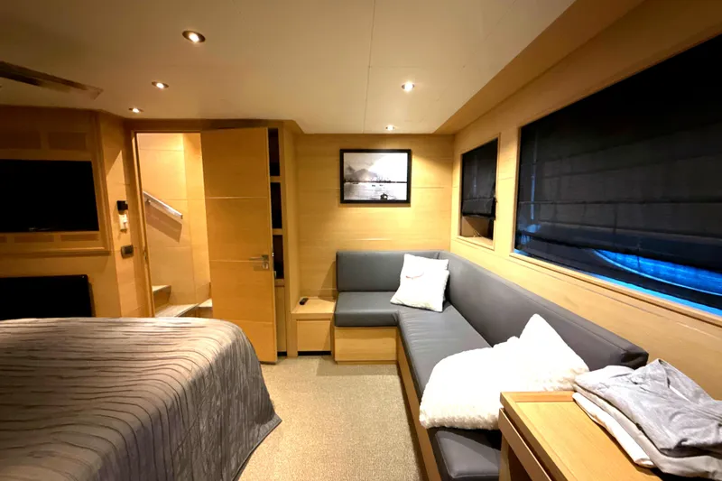  Yacht Photos Pics Luxurious interior of 2008 Conam 75 Widebody yacht with cozy seating and elegant decor.