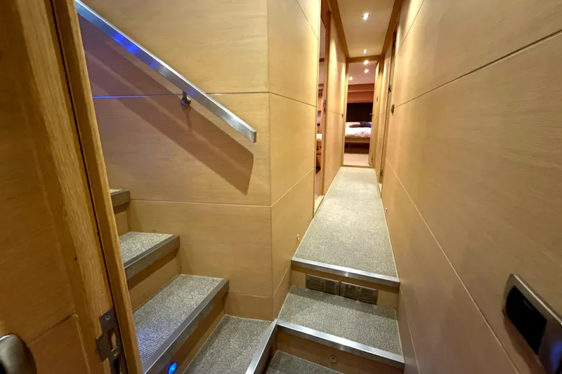  Yacht Photos Pics Interior hallway of 2008 Conam 75 Widebody yacht with modern wooden design.