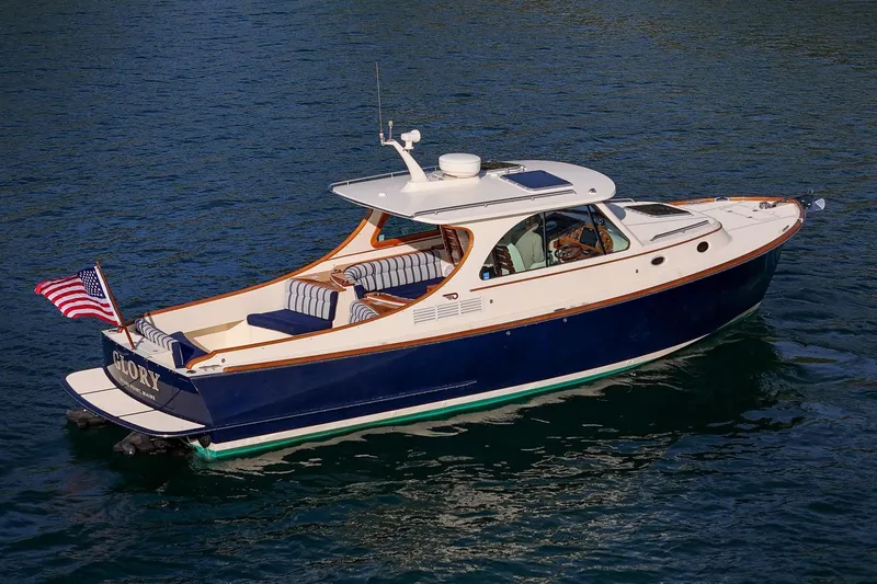 Glory Yacht Photos Pics 2013 Hinckley Talaria 34 yacht cruising on calm blue waters.