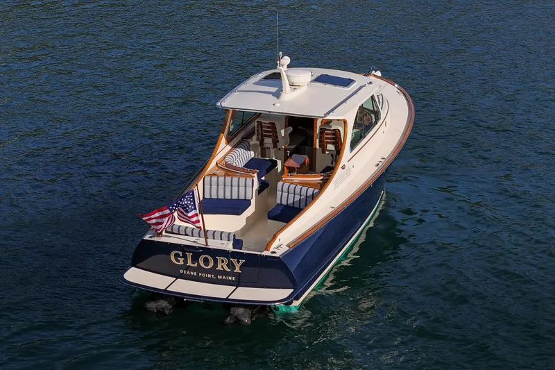 Glory Yacht Photos Pics 2013 Hinckley Talaria 34 boat named "Glory" on water, rear view.