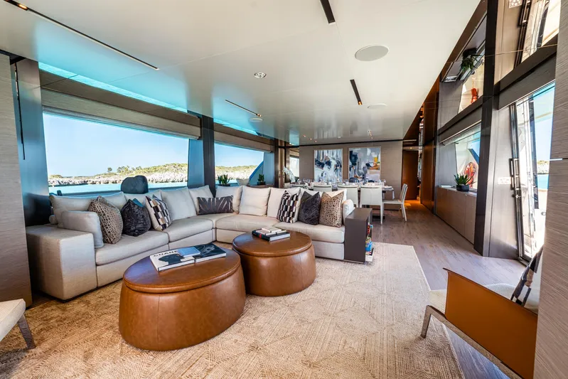 Fifi Yacht Photos Pics Luxurious interior of 2018 Custom Line Navetta 33 yacht with modern furnishings and scenic views.