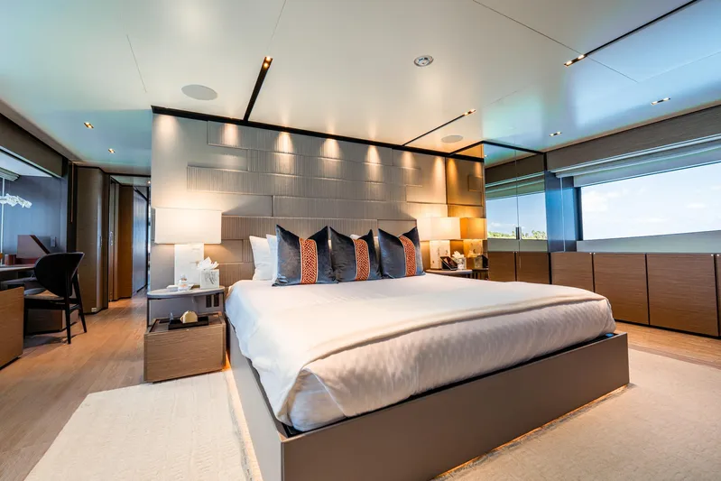 Fifi Yacht Photos Pics Luxurious bedroom interior on 2018 Custom Line Navetta 33 yacht, featuring modern design and elegant decor.