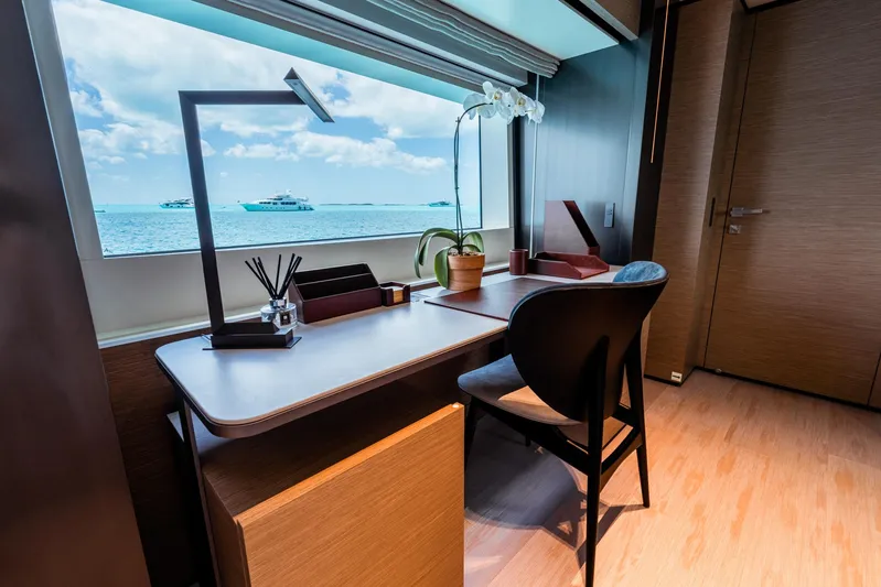 Fifi Yacht Photos Pics Luxurious desk area on 2018 Custom Line Navetta 33 yacht with ocean view.