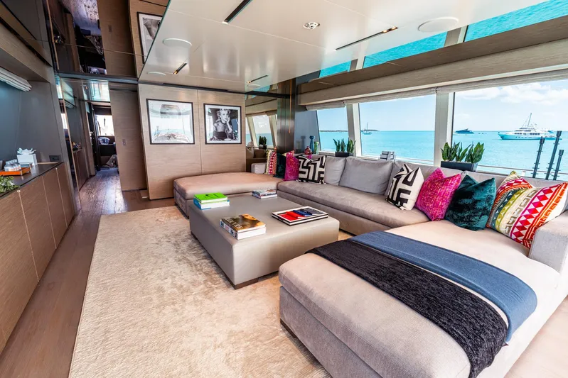 Fifi Yacht Photos Pics Luxurious interior of 2018 Custom Line Navetta 33 yacht with modern decor and ocean view.