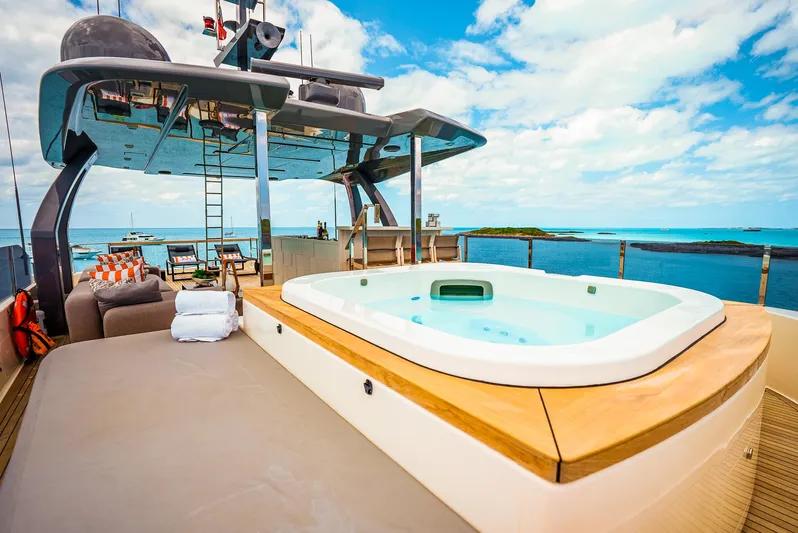 Fifi Yacht Photos Pics Luxurious 2018 Custom Line Navetta 33 yacht with jacuzzi, ocean view, and modern design.