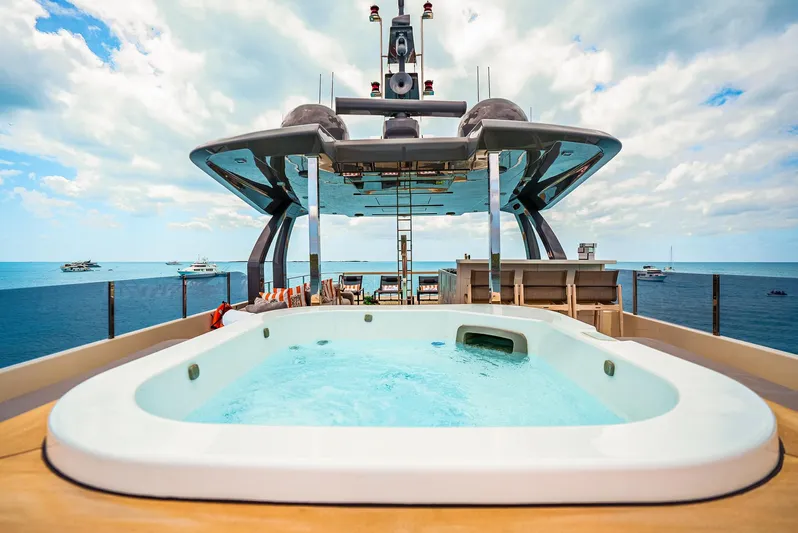 Fifi Yacht Photos Pics Luxurious 2018 Custom Line Navetta 33 yacht with jacuzzi, ocean view, and modern design.