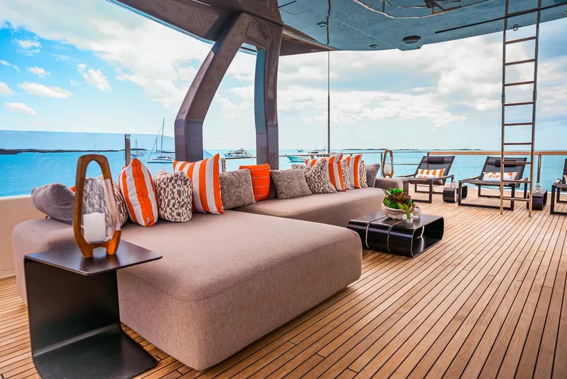 Fifi Yacht Photos Pics Luxurious 2018 Custom Line Navetta 33 yacht deck with stylish seating and ocean view.