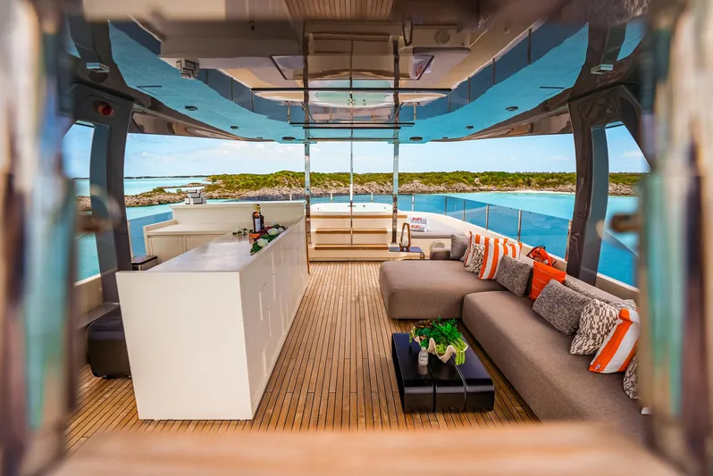 Fifi Yacht Photos Pics Luxurious 2018 Custom Line Navetta 33 yacht interior with modern seating and ocean view.