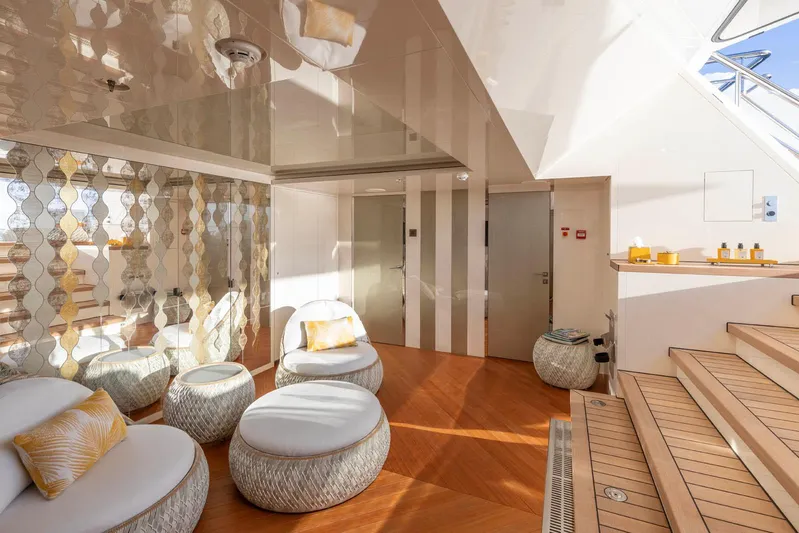 Moonstone Yacht Photos Pics Luxurious interior of 2021 Amels 200 yacht with modern seating and elegant decor.