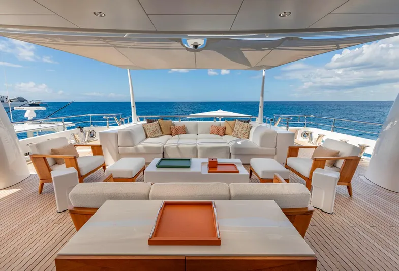 Moonstone Yacht Photos Pics Luxurious Amels 200 yacht deck with elegant seating, ocean view, and modern design, 2021 model.