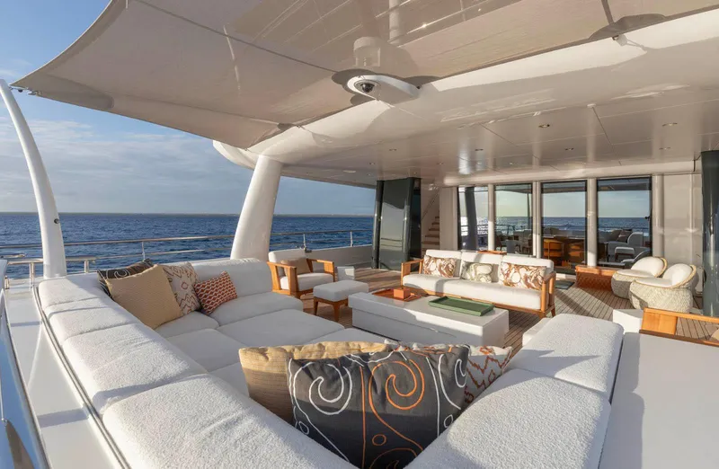 Moonstone Yacht Photos Pics Luxurious Amels 200 yacht deck with elegant seating, ocean view, and modern design, 2021 model.