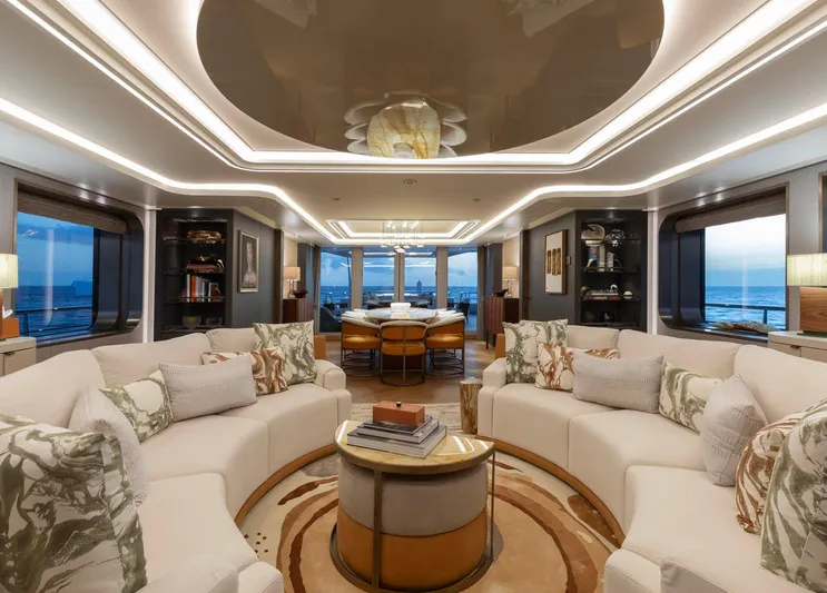 Moonstone Yacht Photos Pics Luxurious interior of 2021 Amels 200 yacht with elegant seating and ocean views.
