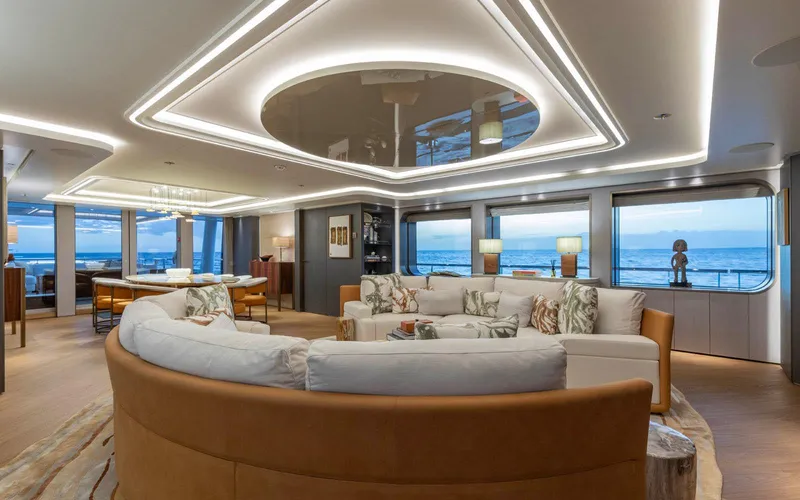 Moonstone Yacht Photos Pics Luxurious interior of 2021 Amels 200 yacht with ocean view and elegant seating area.