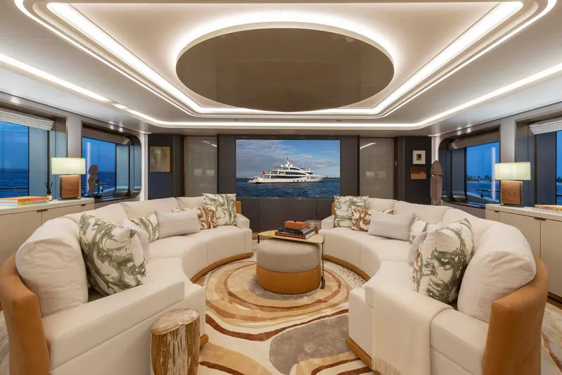 Moonstone Yacht Photos Pics Luxurious interior of 2021 Amels 200 yacht with elegant seating and ambient lighting.