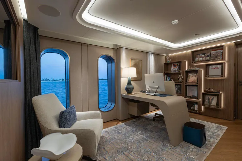 Moonstone Yacht Photos Pics Luxurious office interior on Amels 200 yacht, featuring modern design and ocean views.
