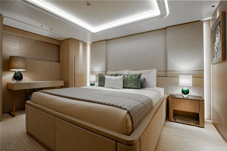 Moonstone Yacht Photos Pics Luxurious bedroom interior on Amels 200 yacht, featuring elegant decor and ambient lighting, 2021 model.