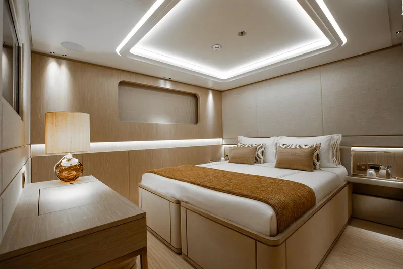 Moonstone Yacht Photos Pics Luxurious bedroom interior of 2021 Amels 200 yacht with modern lighting and elegant decor.