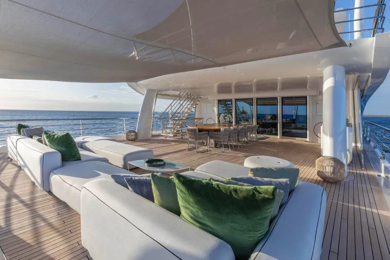 Moonstone Yacht Photos Pics Luxurious Amels 200 yacht deck with elegant seating and ocean view, 2021 model.