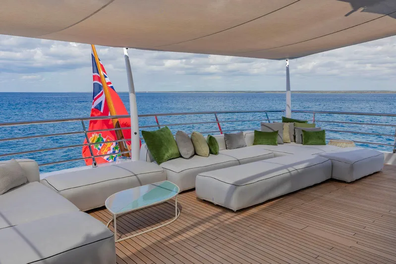 Moonstone Yacht Photos Pics Luxurious deck of 2021 Amels 200 yacht with ocean view and comfortable seating.