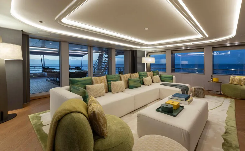 Moonstone Yacht Photos Pics Luxurious interior of 2021 Amels 200 yacht with elegant seating and ocean views.