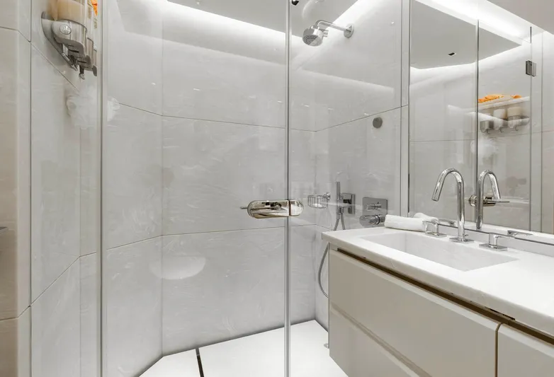 Moonstone Yacht Photos Pics Luxurious bathroom in 2021 Amels 200 yacht, featuring sleek design and modern fixtures.