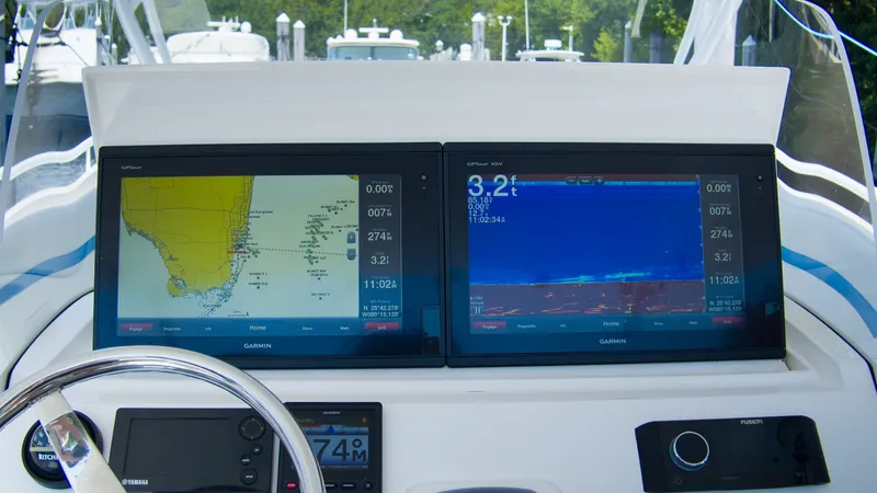 R&r Yacht Photos Pics Intrepid 400 Cuddy 2017 with Garmin navigation systems on the dashboard.