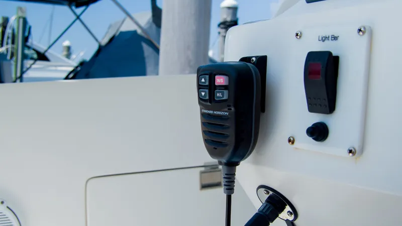 R&r Yacht Photos Pics 2017 Intrepid 400 Cuddy boat control panel with radio.