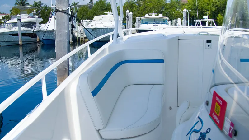 R&r Yacht Photos Pics Intrepid 400 Cuddy 2017 docked with luxurious seating area.