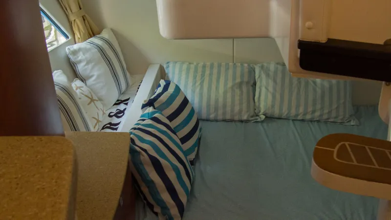 R&r Yacht Photos Pics Interior of 2017 Intrepid 400 Cuddy with cozy pillows.