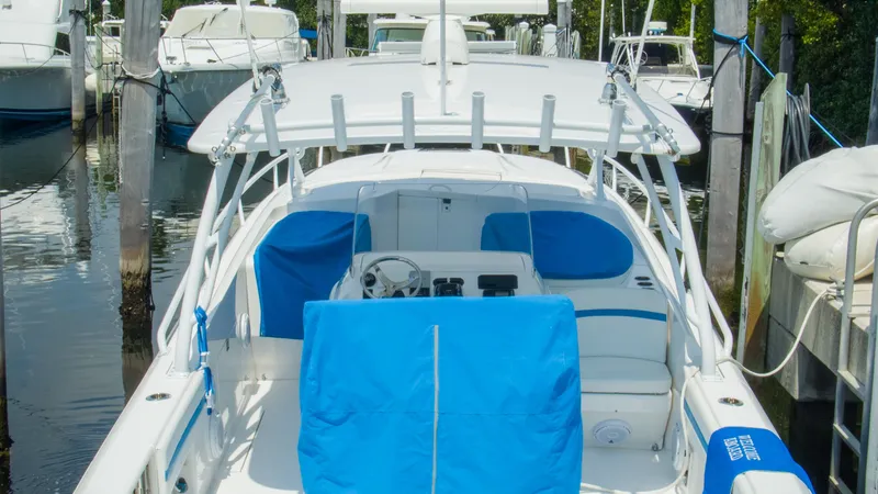 R&r Yacht Photos Pics 2017 Intrepid 400 Cuddy boat docked in marina.