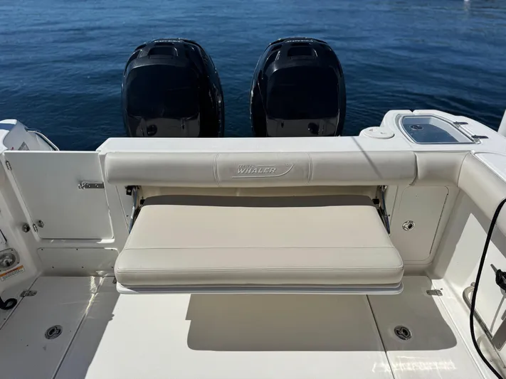  Yacht Photos Pics 2018 Boston Whaler 285 Conquest boat with dual engines and foldable seating.