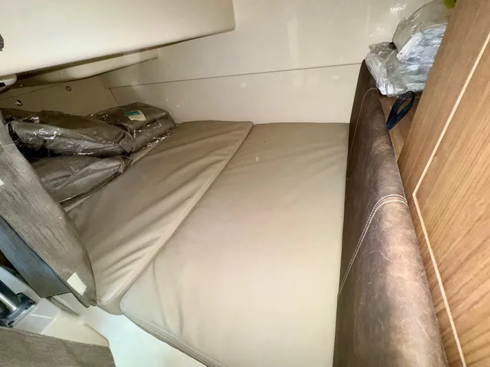  Yacht Photos Pics Interior cabin of 2018 Boston Whaler 285 Conquest with cushioned seating.