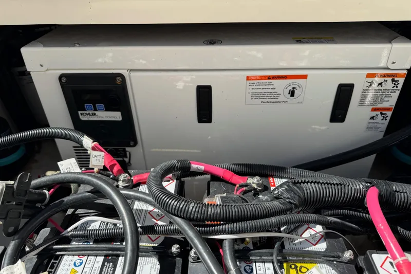  Yacht Photos Pics 2018 Boston Whaler 285 Conquest engine compartment with Kohler generator and wiring.