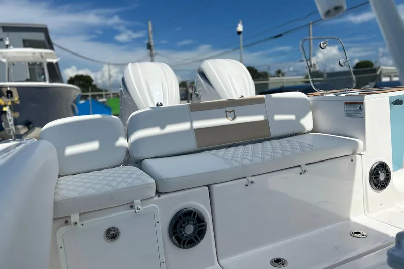 Yacht Photos Pics 2026 Sea Fox 268 Commander boat interior with white seating and speakers.