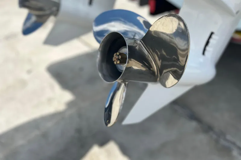  Yacht Photos Pics Close-up of a 2026 Sea Fox 268 Commander boat propeller, shiny and metallic.